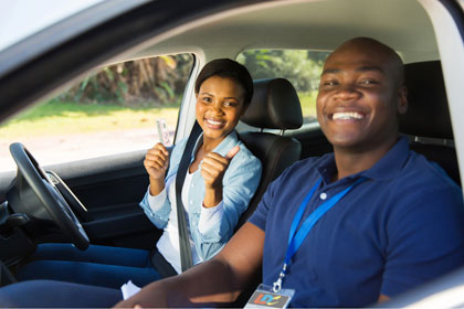 Happy learner with LDC drivinginstructor Car and LD System combined